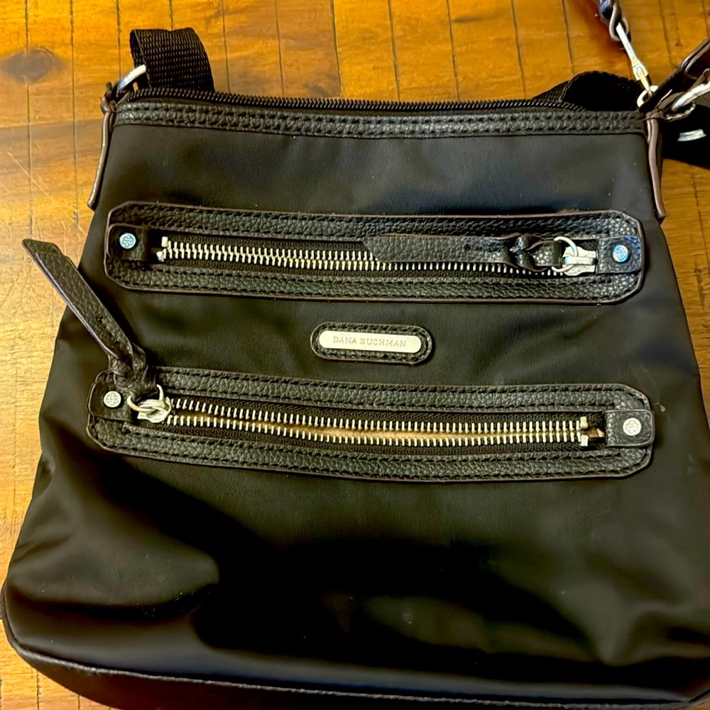Nylon cross body, tons of pockets great for travel
